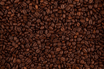 Beautiful texture of coffee beans. Top view. Food background