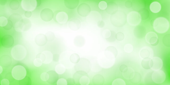 Abstract background with bokeh effects in light green colors
