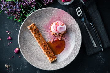 slice of cake and a scoop of ice cream dessert