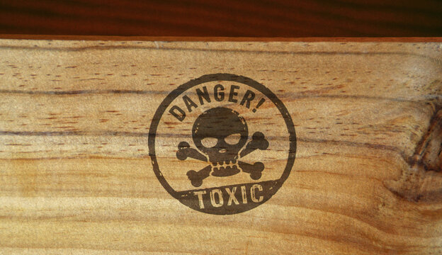 Toxic danger with skull stamp and stamping