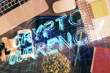 Double exposure of blockchain theme hologram over table with phone. Top view. Crypto technology...