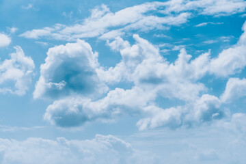 Naklejka na ściany i meble Blue sky with white clouds, nature background.