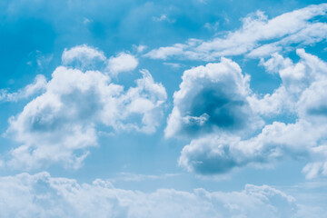 Blue sky with white clouds, nature background.