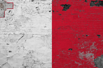 Malta flag on grunge scratched concrete surface. National vintage background. Retro wall concept.