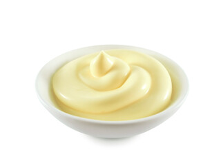 Mayonnaise or cream swirl in ceramic bowl isolated on white background side view
