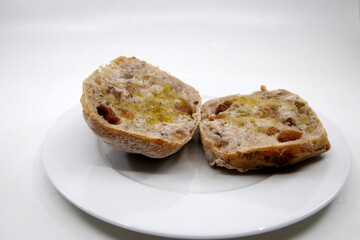 Fototapeta na wymiar Two slices of bread with olive oil