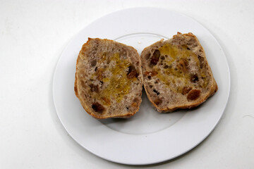 Two slices of bread with olive oil