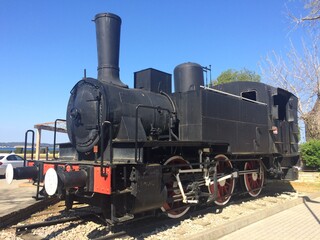 Fototapeta na wymiar Old tender locomotive on a pedestal at the train station in Pula