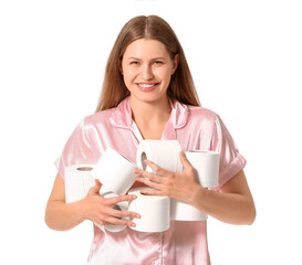 Young woman with many rolls of toilet paper on white background