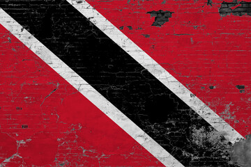 Trinidad And Tobago flag on grunge scratched concrete surface. National vintage background. Retro wall concept.