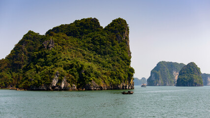 Fototapeta na wymiar It's Ha Long bay islands in the Indochina sea. UNESCO World Heritage site