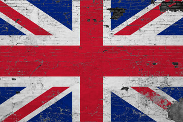 Fototapeta premium United Kingdom flag on grunge scratched concrete surface. National vintage background. Retro wall concept.