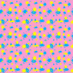 Seamless pattern of yellow and blue paint splashes on a pink background.