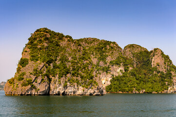 Fototapeta na wymiar It's Nature and rocks of the Halong Bay, Indochina sea, Vietnam. UNESCO World Heritage