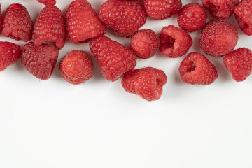 Raspberry fruits on a white background
