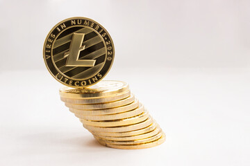 Crypto currency on a gray background - litecoins