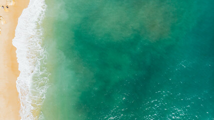 Fototapeta na wymiar Coast as a background from top view. Turquoise water background from top view. Summer seascape from air.