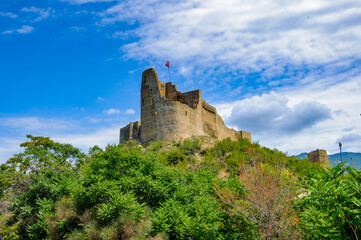 Fototapeta na wymiar It's Old fortress on the mountain hill in Georgia