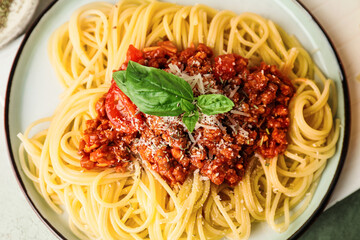 Tasty pasta bolognese on plate, closeup