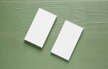 Blank business cards on wooden background