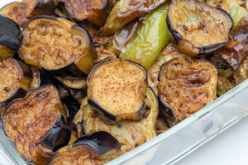 Turkish Food Fried, Aubergine or Eggplant Slices and potatoes on the glass plate.
