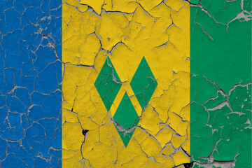 Saint Vincent And The Grenadines flag close up grungy, damaged and scratched on wall peeling off...