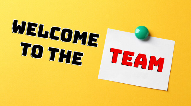 Welcome To The Team. Paper Note And Text On Yellow Background