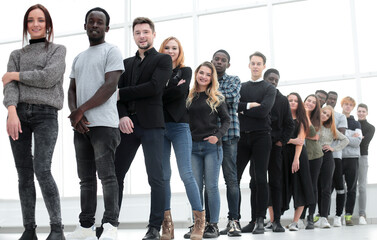 group of serious young people standing in line.