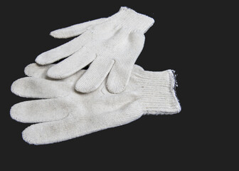 White work gloves on black
