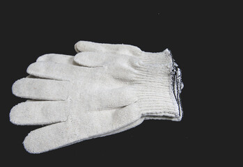 White work gloves on black