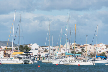 Fototapeta na wymiar Sea and coast landscape with boats in Portocolom