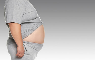Closeup view of overweight man on light grey background, space for text
