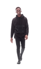 Fototapeta premium cheerful guy in autumn jacket striding forward