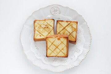  cut pattern on toasted orange bread for gourmet breakfast
