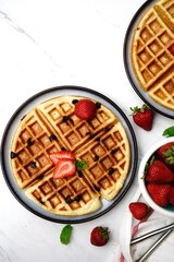 Homemade Chocolate chip waffles with strawberries
