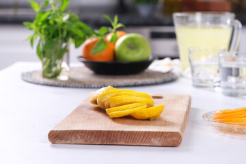 Slice lemon. Making Lemonade. jug and glass