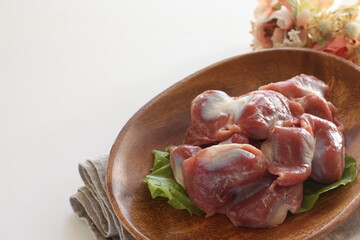 Chinese food ingredient,  prepared gizzard on wooden plate