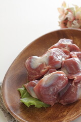 Chinese food ingredient,  prepared gizzard on wooden plate