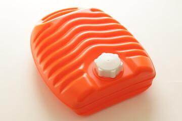 orange color, hot pot plastic warmer for winter house keeping