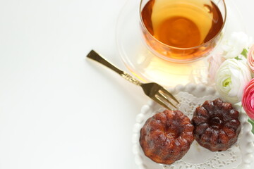 French confectionery, Canele sweet dessert on dish with copy space
