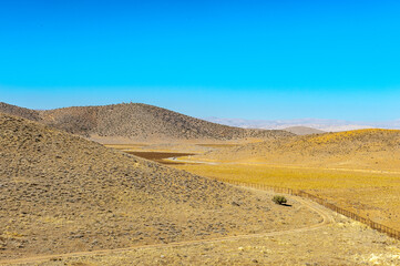 Fototapeta na wymiar It's Desert near the ancient Persian city of Pasargad, Iran. UNESCO World Heritage