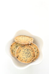 Homemade black sesame cookie on dish with copy space