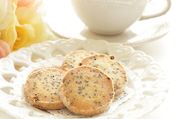 Homemade black sesame cookie on dish with copy space