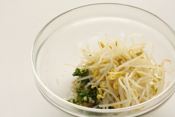Korean cooking, boiled soy bean sprout and seasoning, green onion
