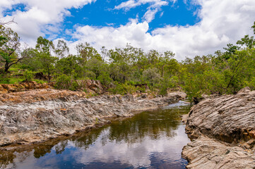 Naklejka na ściany i meble Fresh water creek and swimming hole in the summer, Kroombit Tops National Park, Queensland