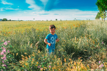Fototapeta premium happy child strolling through nature in the new normal without technology