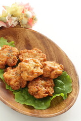 Chinese food, fish cake on lettuce with copy space