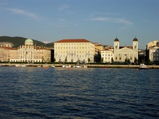 Fototapeta na wymiar Trieste, Italy, Buildings Along the Waterfront
