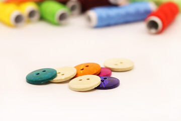 threads and buttons of various colors