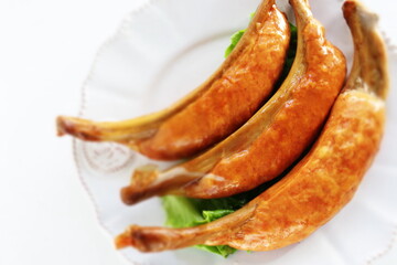 Food ingredient, sausage with bone  on lettuce with copy space 